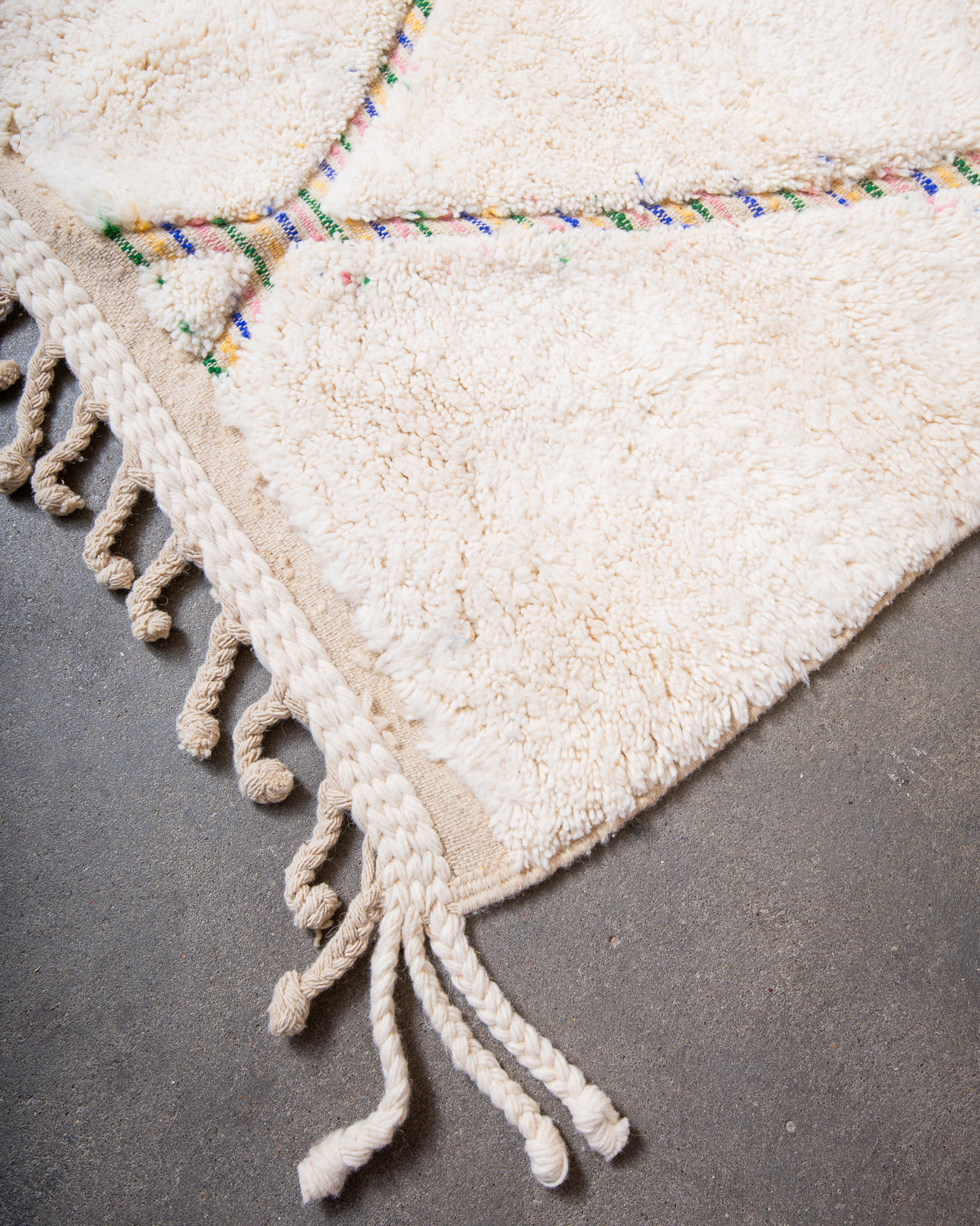 Modern, designer, handcrafted Berber rug from Morocco. Beniourain carpet with beautiful colours and patterns and fluffy wool texture.